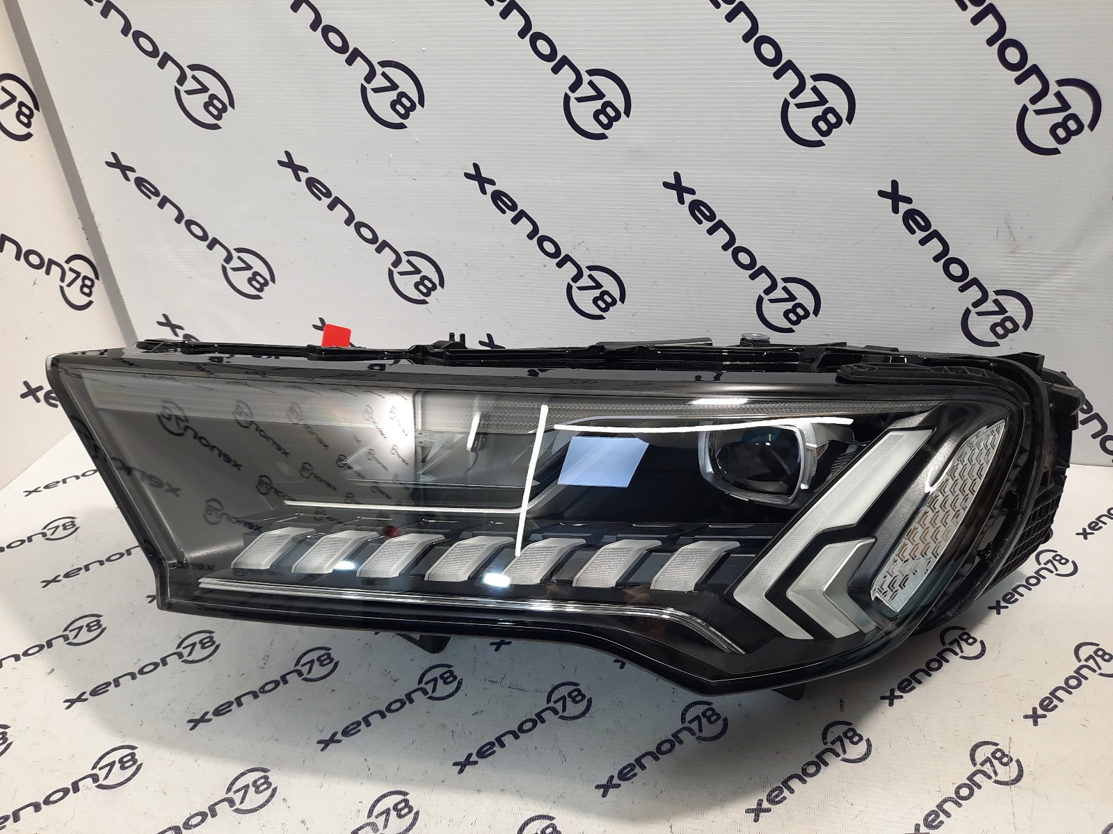 Фара Audi Q7 (2рест.) левая 4M0941039C б/у 21. (новое стекло, есть потёртости на хроме)